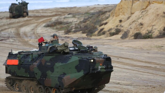 Marines with 1st Battalion, 5th Marine Regiment, 1st Marine Division, along with elements of the 7th Singaporean Infantry Brigade, clear a combat town as part of Exercise Valiant Mark 14.2 aboard Camp Pendleton, Calif., Dec. 15, 2014. Exercise Valiant Mark enhances the United States and Singaporean armed forces’ combined combat readiness through live-fire and urban terrain training as well as amphibious operations familiarization.
