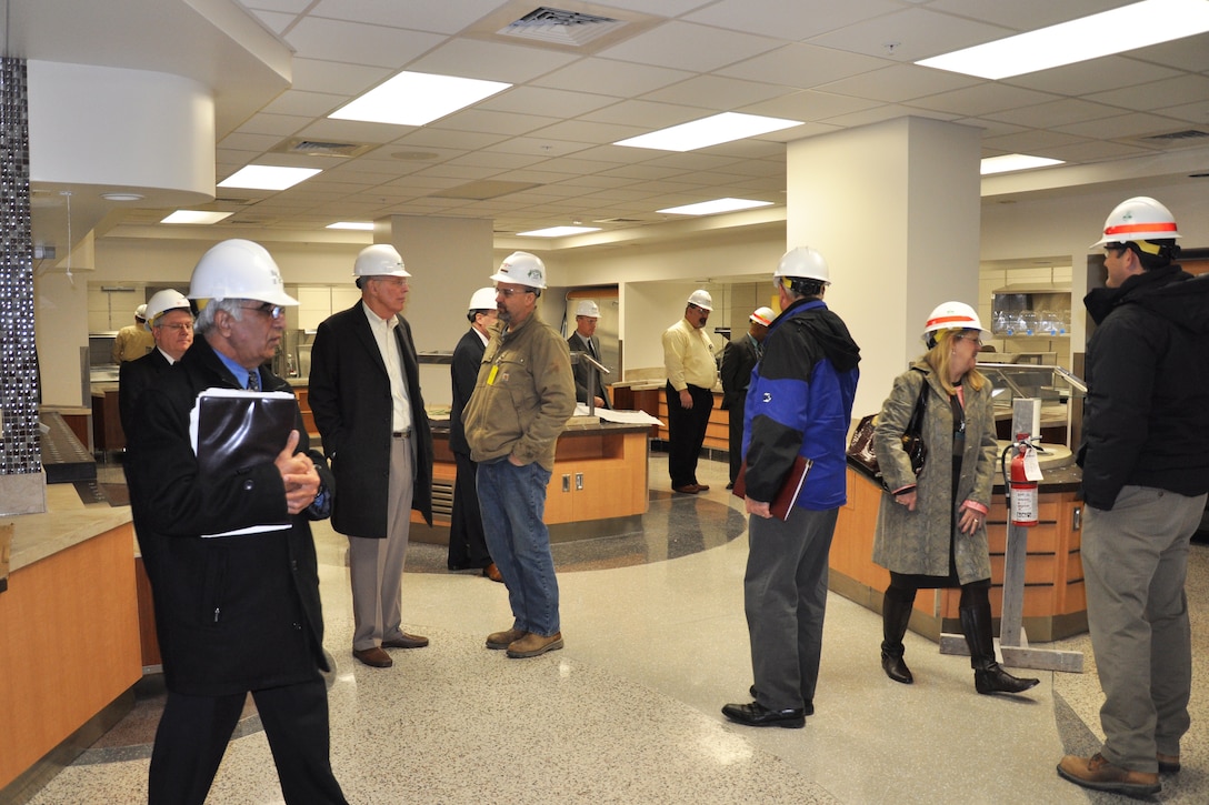 Team members tour the new, sleek dining facility at the hospital Dec. 4, 2014.