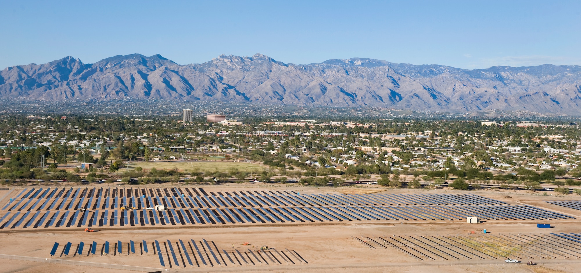 Solar panels at Davis-Monthan Air Force Base, Ariz., collect sunlight. The Davis-Monthan solar array project, on 170 acres of underutilized land, makes it the largest of its kind on any Defnese Department installation. (U.S. Air Force photo/1st Lt. Sarah Ruckriegle) 
