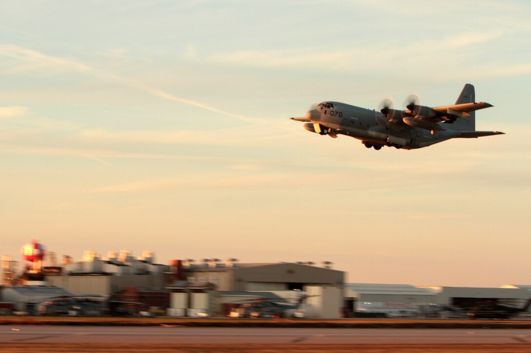 A KC-130J Super Hercules with Marine Aerial Refueler Transport Squadron 252 rises toward the southwestern sky at Marine Corps Air Station Cherry Point, N.C., Dec. 17, 2014.
VMGR-252 is a heavy lift, troop transport and aerial refueler squadron with 2nd Marine Aircraft Wing, and supports Marine Air-Ground Task Force training and operations in the United States and abroad.
Cherry Point is home to 2nd MAW and several of its squadrons. Its runways operate 24/7, 365 days each year, and the air station hosts squadrons that specialize in air-to-ground attack support; electronic warfare; aerial transport and refueling; and sea and land search and rescue. 
