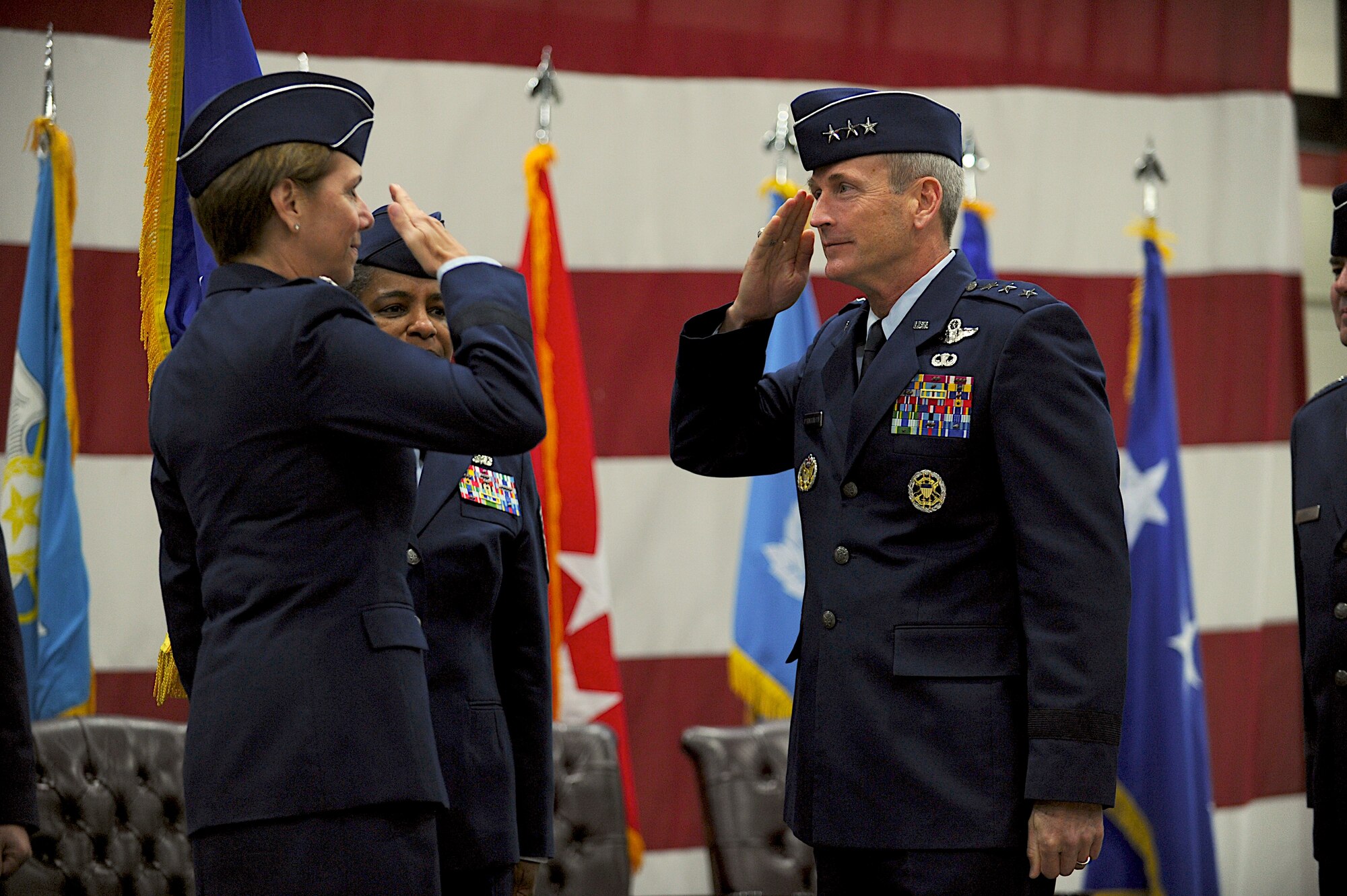 Lt. Gen. Terrence J. O'Shaughnessy salutes Gen. Lori Robinson, Pacific Air Forces commander, symbolically accepting command of Seventh Air Force during a change of command ceremony at Osan Air Base Dec 19, 2014. Lt. Gen. O'Shaughnessy became the 33rd commander of Seventh Air Force, taking over for Lt. Gen. Jan-Marc Jouas who served in the position for nearly three years. (U.S. Air Force photo by Maj. John Ross)