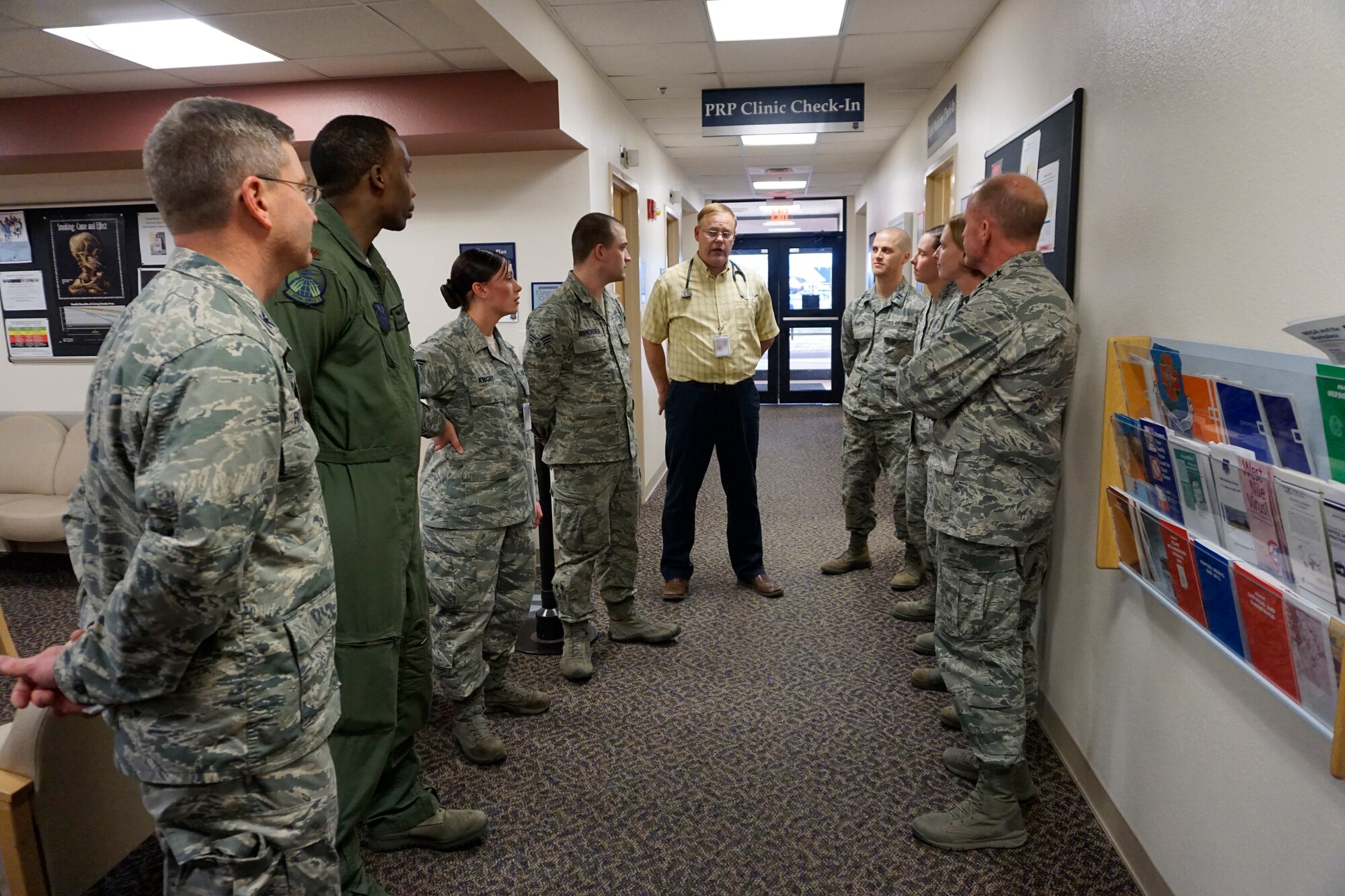Lt. Gen. Stephen Wilson, Air Force Global Strike Command commander, meets with Airmen assigned to the Personal Reliability Program Clinic at the Medical Treatment Facility on F.E. Warren Air Force Base, Dec. 10, 2014. Airmen on PRP now have less follow-up appointments after off-base treatment thanks to the Force Improvement Program, which results in less time spent away from the mission. Portions of this image have been blurred for security reasons. (U.S. Air Force Photo/Lan Kim)