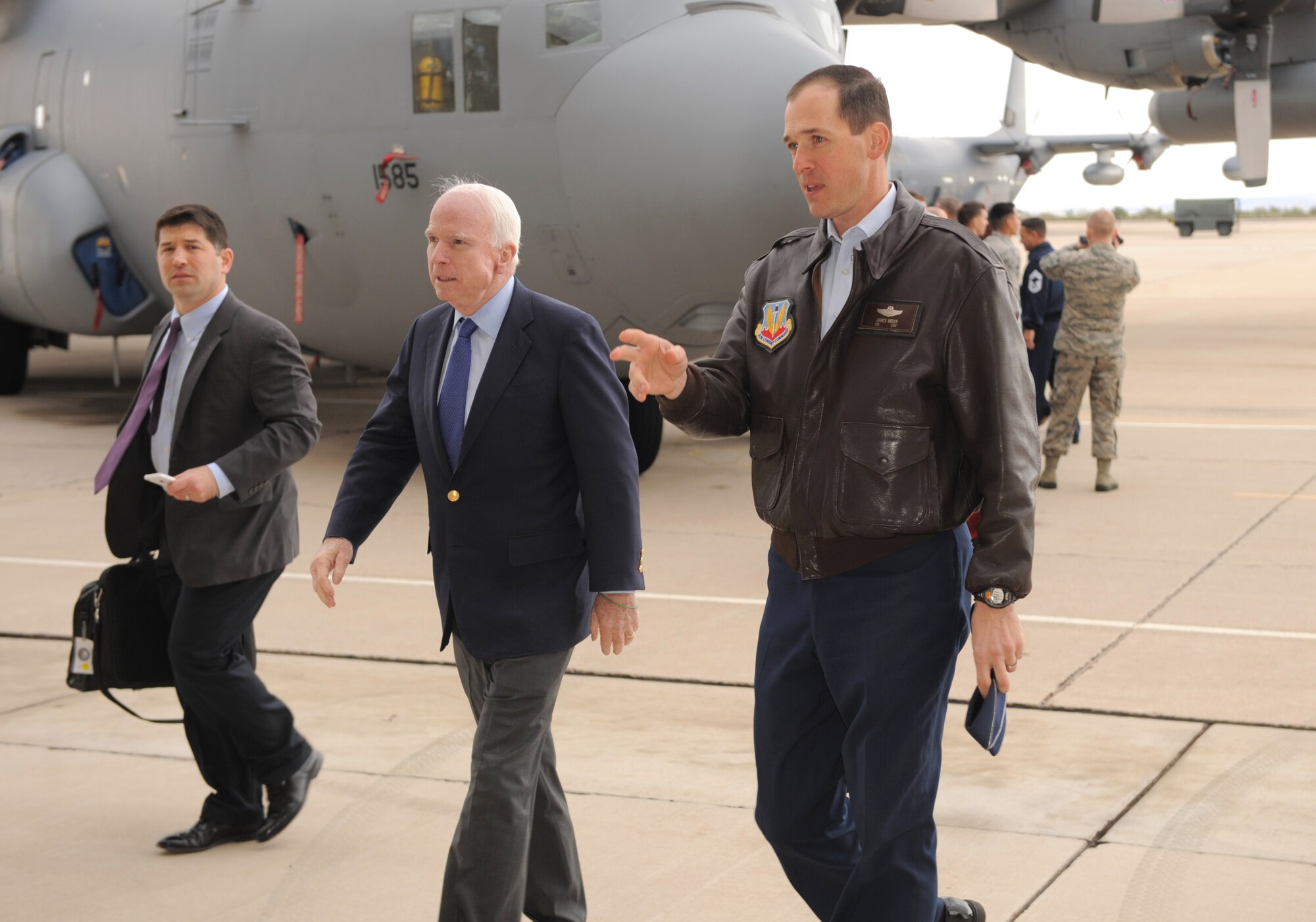 U.S. Air Force Col. James P. Meger, 355th Fighter Wing commander, walks with Sen. John McCain at Davis-Monthan Air Force Base Ariz., Dec. 18, 2014. Sens. McCain and Jeff Flake, as well as Rep. Paul Gosar of Arizona, were visiting several military installations across Arizona throughout the day. (U.S. Air Force photo by Airman 1st Class Chris Drzazgowski)