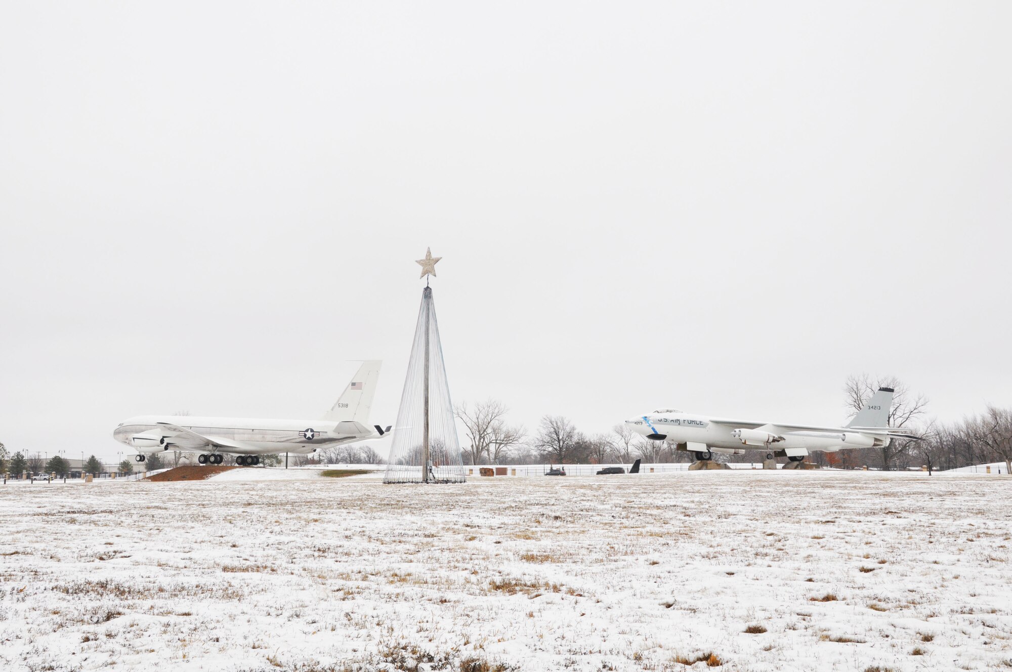 McConnell's holiday tree was covered in snow after a storm hit the base Dec. 17, McConnell Air Force Base, Kan., Dec. 18, 2014.  The storm resulted in more than 2 inches of snow.  (U.S. Air Force photo by Tech. Sgt. Abigail Klein)