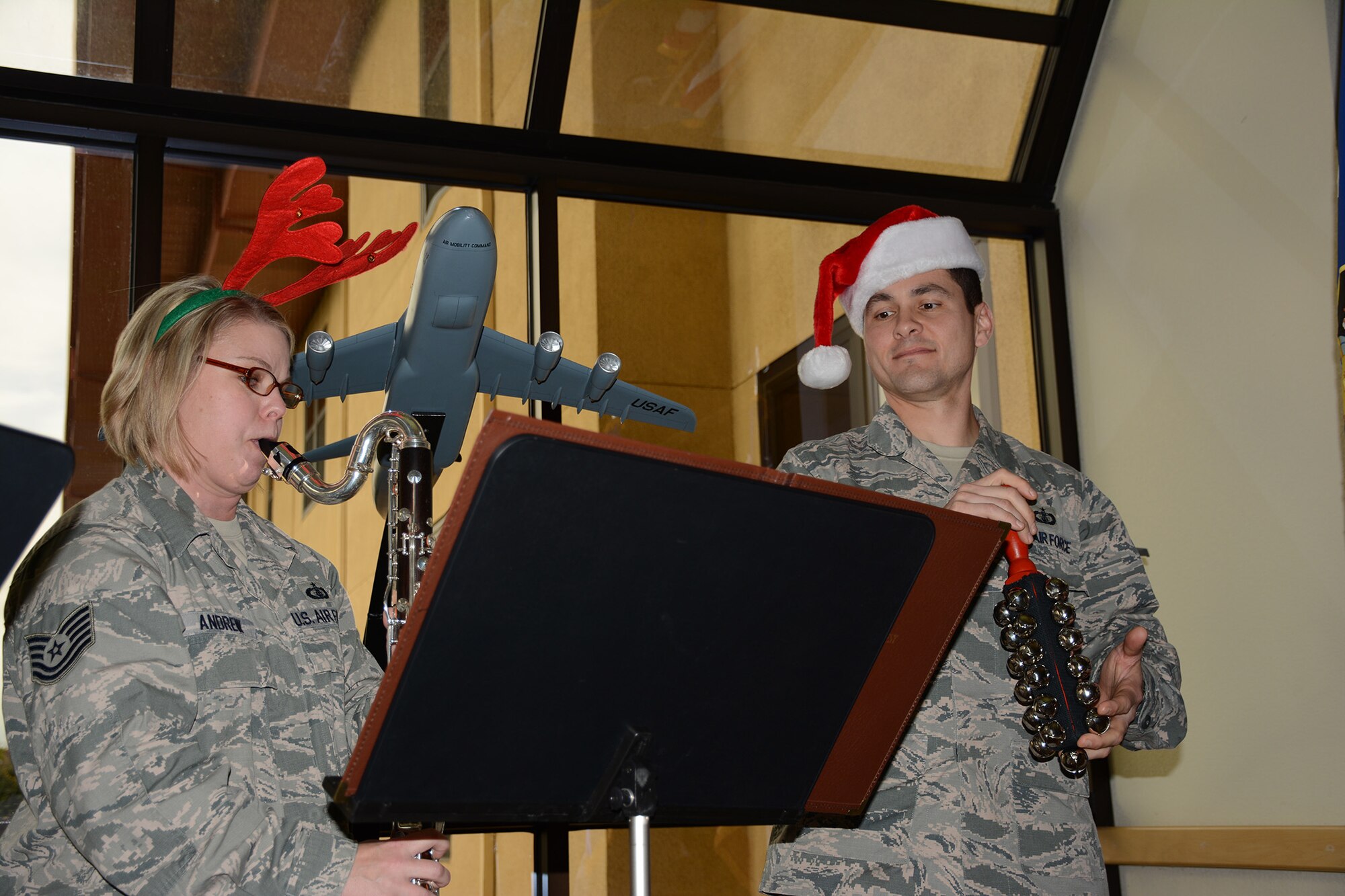 TRAVIS AIR FORCE BASE, Calif. -- Members of the Air Force Band of the Golden West stopped by to give a little holiday cheer to the wing staff members of the 349th Air Mobility Wing, Dec. 16. (U.S. Air Force photo/2d Lt. Stephen Collier) 