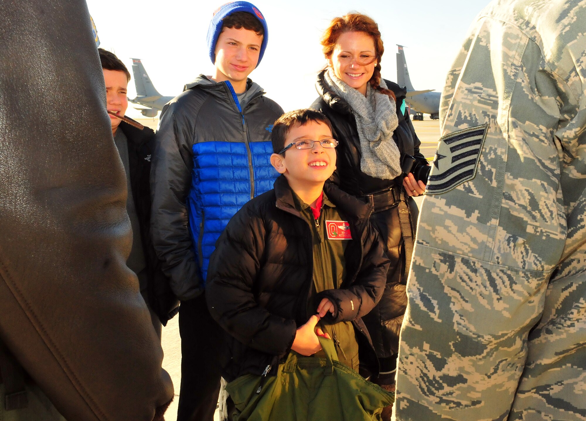 The 121st Air Refueling Wing hosted eight year old Roman Pettograsso for their inaugural pilot for a day program Dec 11, 2014, at Rickenbacker Air National Guard Base, Ohio. (U.S. National Guard photo by Airman 1st Class Wendy Kuhn/released)

