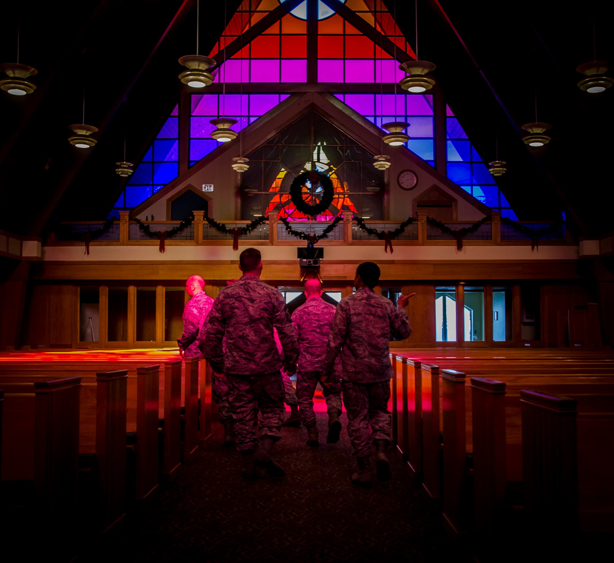 Col. Jeffrey DeVore, Joint Base Charleston commander, and Chief Master Sgt. Mark Bronson, 628th Air Base Wing command chief, are led through the Chapel at JB Charleston - Air Base, S.C. The tour was part of an initiative to show JB Charleston leadership a closer look at various missions throughout JB Charleston. (U.S. Air Force photo / Senior Airman Tom Brading)