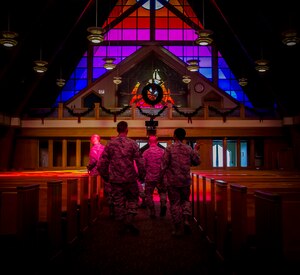 Col. Jeffrey DeVore, Joint Base Charleston commander, and Chief Master Sgt. Mark Bronson, 628th Air Base Wing command chief, are led through the Chapel at JB Charleston - Air Base, S.C. The tour was part of an initiative to show JB Charleston leadership a closer look at various missions throughout JB Charleston. (U.S. Air Force photo / Senior Airman Tom Brading)