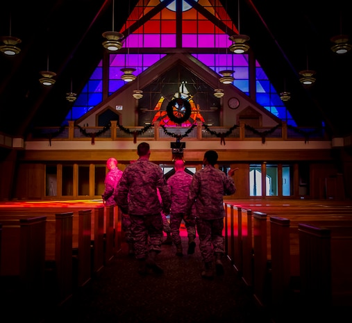 Col. Jeffrey DeVore, Joint Base Charleston commander, and Chief Master Sgt. Mark Bronson, 628th Air Base Wing command chief, are led through the Chapel at JB Charleston - Air Base, S.C. The tour was part of an initiative to show JB Charleston leadership a closer look at various missions throughout JB Charleston. (U.S. Air Force photo / Senior Airman Tom Brading)