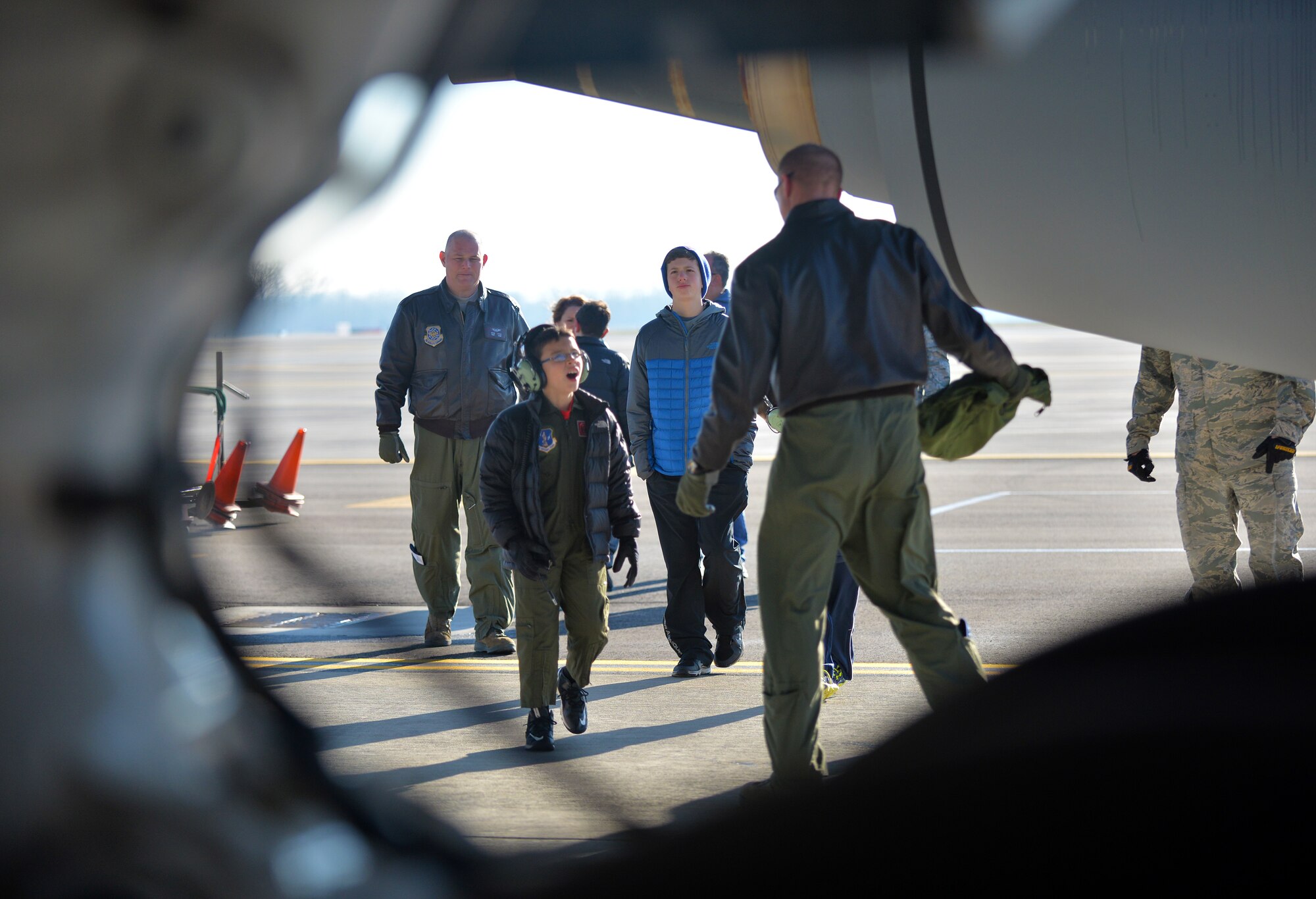 The 121st Air Refueling Wing hosted eight year old Roman Pettograsso for their inaugural pilot for a day program Dec 11, 2014, at Rickenbacker Air National Guard Base, Ohio. (U.S. Air National Guard photo by Master Sgt. Ralph Branson/Released)