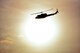 A UH-1N Helicopter flies over Minot Air Force Base, N.D., Dec. 11, 2014. The UH-1N is a light-lift utility helicopter used to support Air Force Global Strike Command missile wings and groups, Air Force District of Columbia, Air Force Survival School training, Air Advisory Operations, test and evaluation at Eglin AFB, Fla., and U.S. Pacific Command, as well as other agencies. (U.S. Air Force photo/Senior Airman Brittany Y. Bateman)