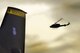 A UH-1N Helicopter flies over Minot Air Force Base, N.D., Dec. 11, 2014. The UH-1N is a light-lift utility helicopter used to support Air Force Global Strike Command missile wings and groups, Air Force District of Columbia, Air Force Survival School training, Air Advisory Operations, test and evaluation at Eglin AFB, Fla., and U.S. Pacific Command, as well as other agencies. (U.S. Air Force photo/Senior Airman Brittany Y. Bateman)