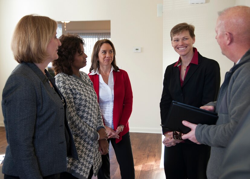 Base leadership spouses tour a home located in the Eastside Family Housing community during a tour of Barksdale Air Force Base, La., Dec. 16, 2014. The spouses were given the opportunity to ask questions about the community and how Airmen enjoy their living situations. (U.S. Air Force photo/Senior Airman Joseph A. Pagán Jr.)
