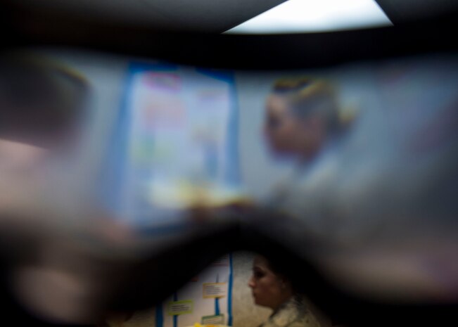 The view from a pair of goggles which simulate the effects of drunkenness is shown Dec. 12, 2014, at Joint Base Charleston, S.C. during a 628th Mental Health Open House. The open house event was designed to show commanders and first sergeants what mental health has to offer to Airmen. In addition to treating military related post-traumatic stress disorder, mental health has the capability to assist with a wide variety of life stressors through programs like Family Advocacy, Alcohol and Drug Abuse Prevention Program and Behavioral Health. (U.S. Air Force photo/Senior Airman Jared Trimarchi)