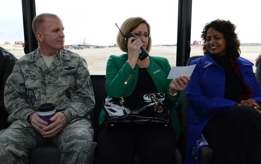 Nancy Wilson, spouse of Lt. Gen. Stephen Wilson, commander of Air Force Global Strike Command, performs a radio check during a tour of the flightline on Barksdale Air Force Base, La., Dec. 17, 2014. AFGSC leadership and their spouses visited the 2nd Bomb Wing to tour its facilities and to speak with Airmen about their concerns. (U.S. Air Force photo/Senior Airman Benjamin Gonsier)