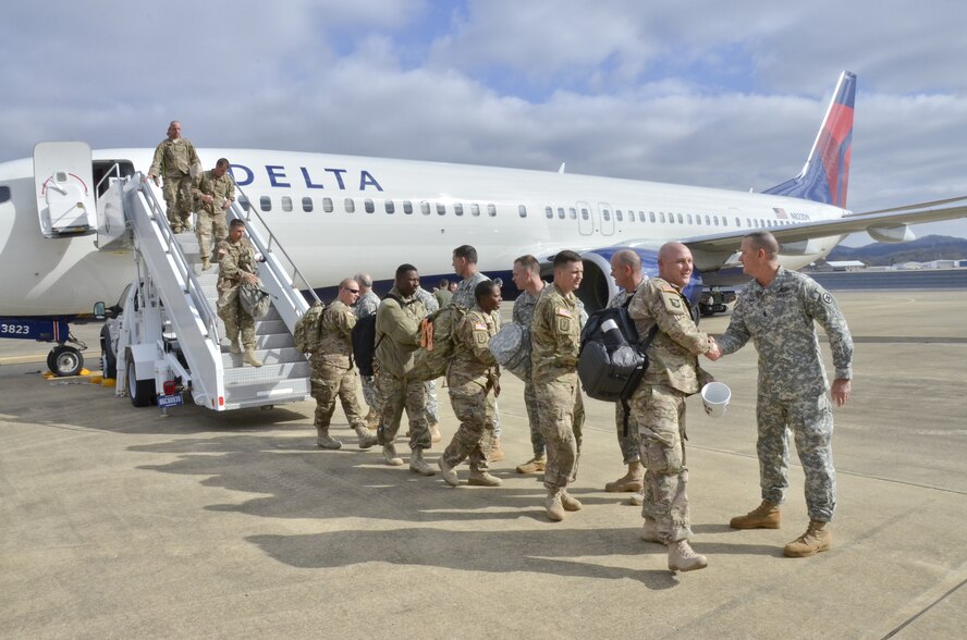 More than 158 Alabama Army National Guard Soldiers from the 877th Engineering Battalion arrive at the 117th Air Refueling Wing, Birmingham Alabama as they return home from a deployment in support of Operation Enduring Freedom. The 877th provided engineer support for the CENTCOM Material Recovery Element, assisting the United States Central Command Material Retrograde Element (CMRE) with recovery of military equipment to the U.S. from Afghanistan.(U.S. Air National Guard photo by: Senior Master Sgt. Ken Johnson/Released)