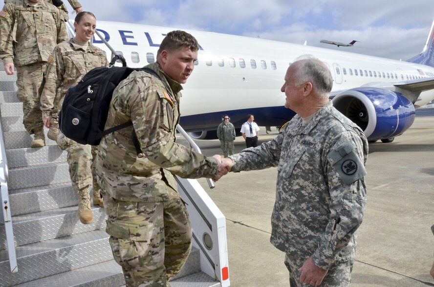 More than 158 Alabama Army National Guard Soldiers from the 877th Engineering Battalion arrive at the 117th Air Refueling Wing, Birmingham Alabama as they return home from a deployment in support of Operation Enduring Freedom. The 877th provided engineer support for the CENTCOM Material Recovery Element, assisting the United States Central Command Material Retrograde Element (CMRE) with recovery of military equipment to the U.S. from Afghanistan.(U.S. Air National Guard photo by: Senior Master Sgt. Ken Johnson/Released)