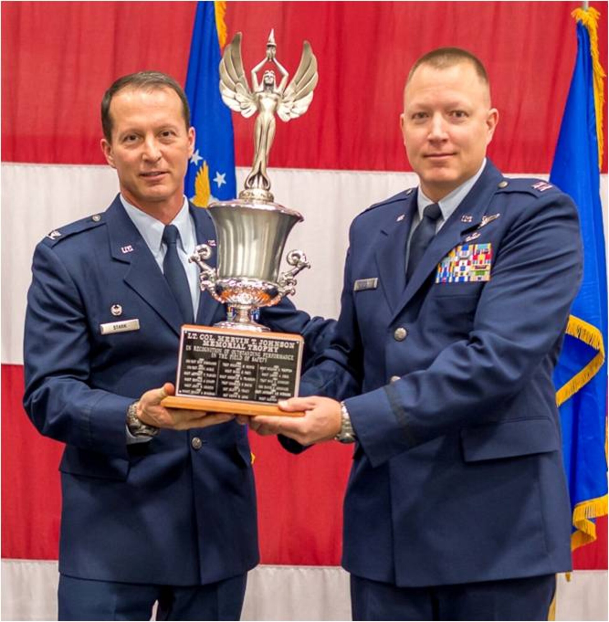Capt. Thomas Dorsett of the 192nd Airlift Squadron accepts the Safety Award from the 152nd Airlift Wing Commander, Col. Karl Stark, at the Nevada Air National Guard’s Annual Awards Ceremony on December 7, 2014.USAF photo by Maj. Kristoffer Pfalmer RELEASED.
