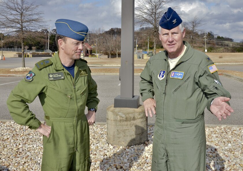 Brigadier General Alain Pelletier, Deputy Commander Continental NORAD Region is greeted by Colonel Cliff James, Wing Commander of the 117th Air Refuelling Wing. Pelletier was briefed on base operations during his 2 December 2014 visit to the 117 ARW. (U.S. Air National Guard photo by: Senior Master Sgt. Ken Johnson/Released)