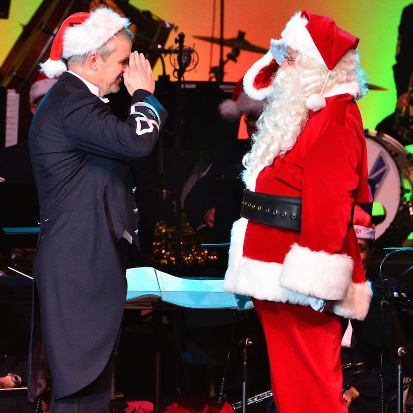 The Concert Band and Singing Sergeants returned to DAR Constitution Hall this year to perform their Spirit of the Season holiday concert.  Santa even made an appearance and showed proper courtesies to Colonel Lang. (US Air Force Photo by Senior Master Sgt Bob Kamholz/released)