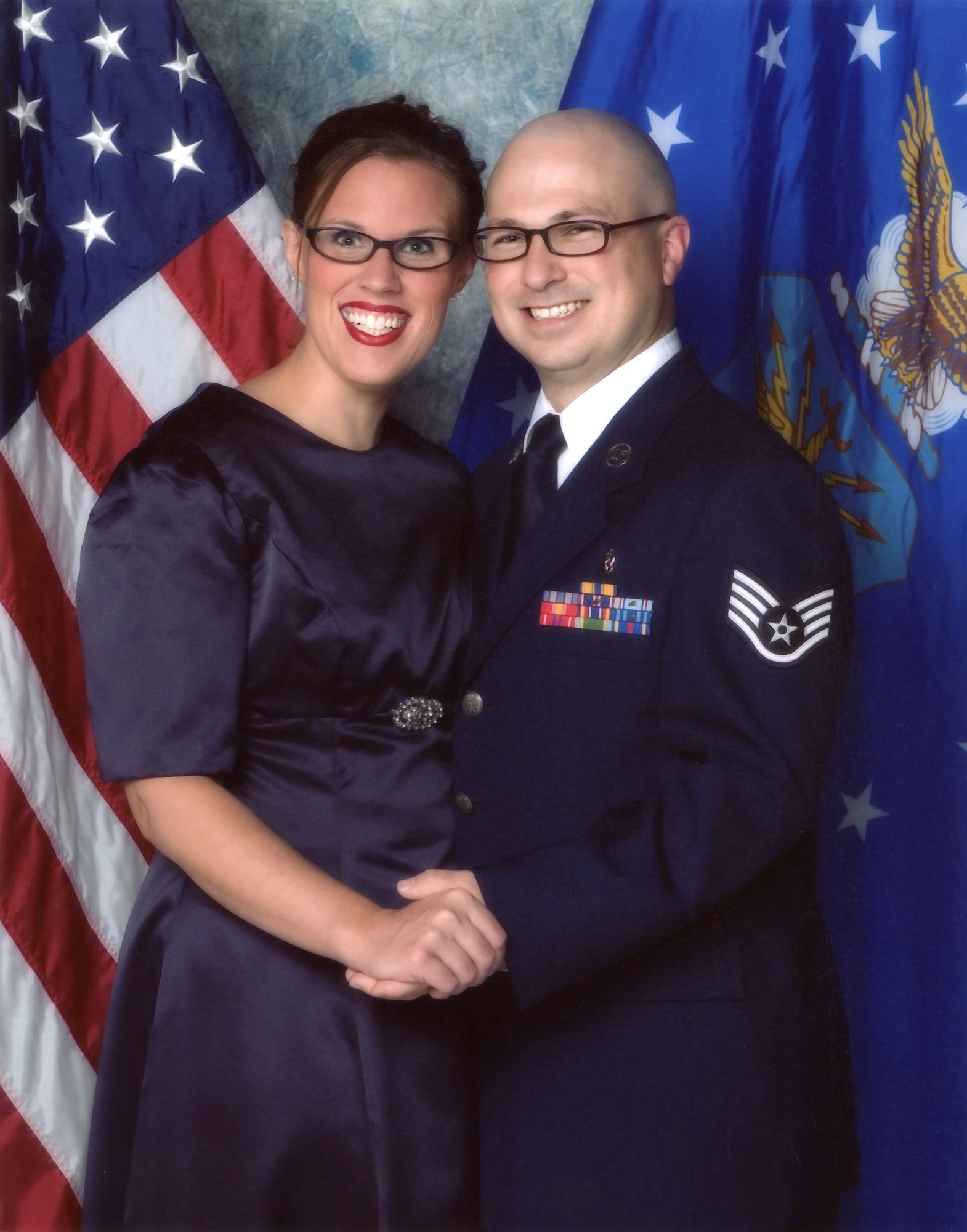 Staff Sgt. Derek Ramos and his wife Emily, posing for picture at a recent Air Force ball, were killed Dec. 13 in an off-roading accident. Their two children survived the accident. Team Hill gathered for a memorial service at the base chapel and flags flew at half-staff on Dec. 17. Ramos was 34 years old and worked as the Non-Commissioned Officer-in-Charge of the Satellite Pharmacy, 75th Medical Support Squadron. He joined the Air Force in February 2005 and arrived at Hill Air Force Base in August 2010. (Courtesy photo) 