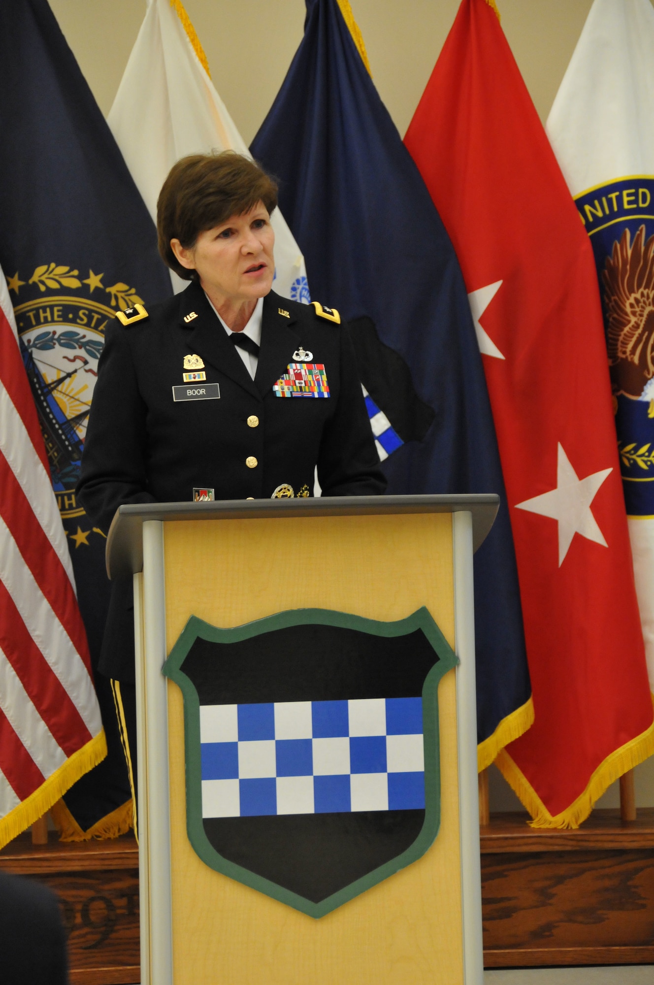 Maj. Gen. Margaret W. Boor, commanding general of the Army Reserve's 99th Regional Support Command, speaks during the Dec. 13 grand opening and memorialization ceremony for the 1st Lt. Paul A. Doble Army Reserve Center in Portsmouth, New Hampshire. The new facility is named for Doble, who served with the Army's 180th Infantry Regiment during World War II and was killed in action in France Sept. 25, 1944, earning a Purple Heart and Silver Star. (U.S. Army photo by Staff Sgt. Shawn Morris/Released)