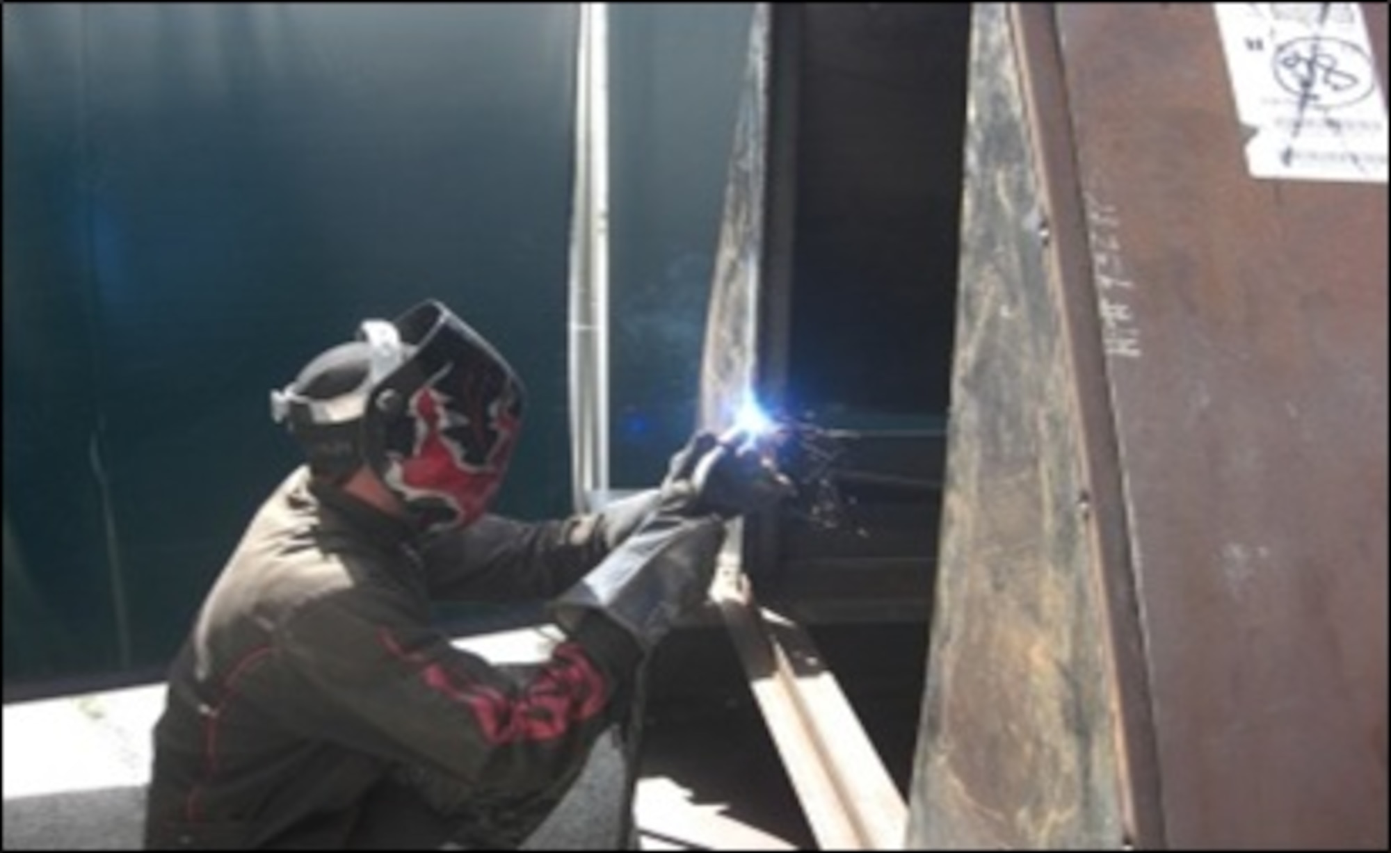 Staff Sgt. Gregory Lyon welding end panels. (Courtesy Photo/Master Sgt. Jason Willis)