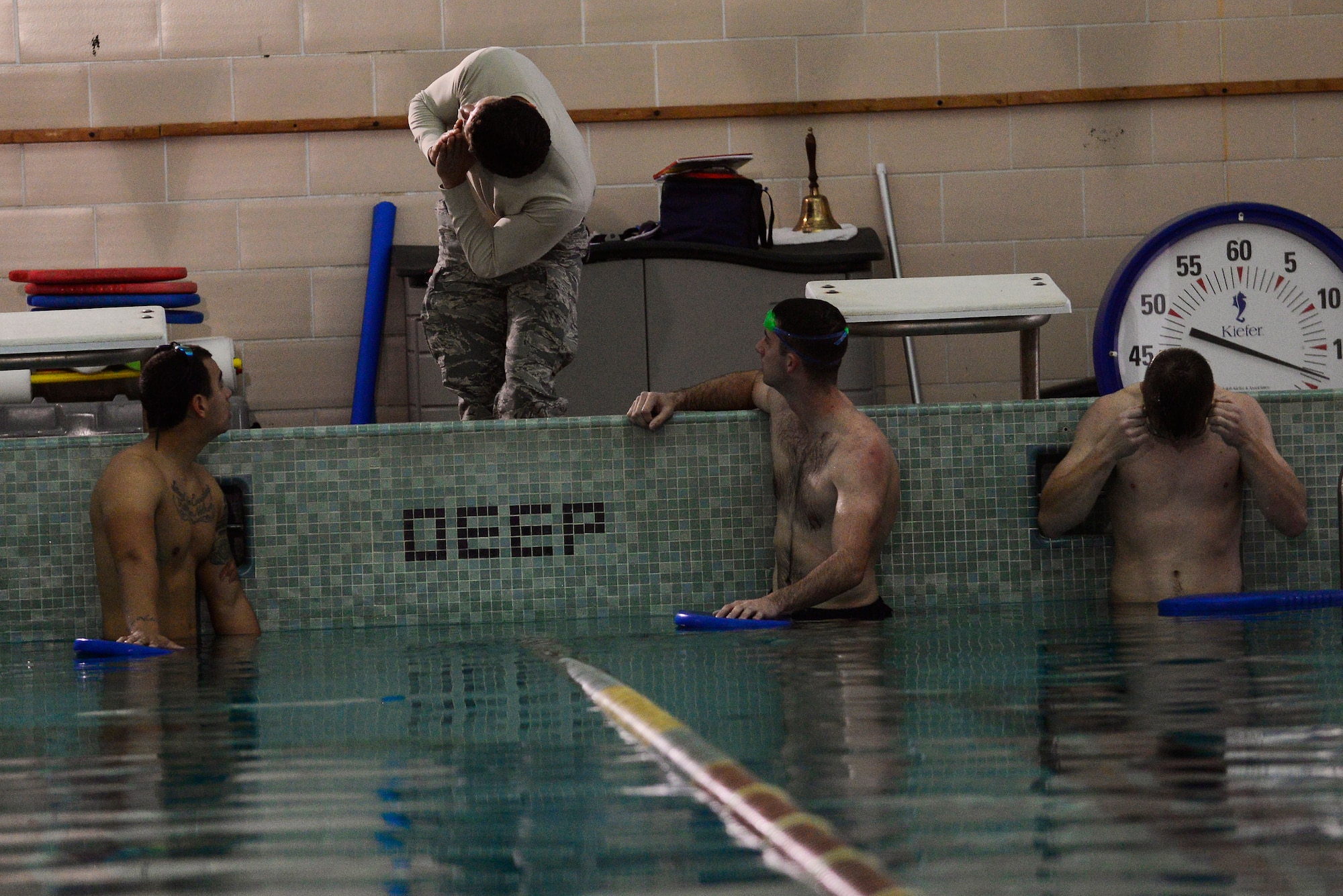 U.S. Air Force Airmen receive instruction on proper swimming techniques to assist them with the swimming portion of the physical ability and stamina test at the Young Men’s Christian Association in Sumter, S.C., Dec. 10, 2014. Aspiring special tactics Airmen must meet all of the PAST qualifications for the career field they wish to enter. (U.S. Air Force photo by Airman 1st Class Diana M. Cossaboom/Released)