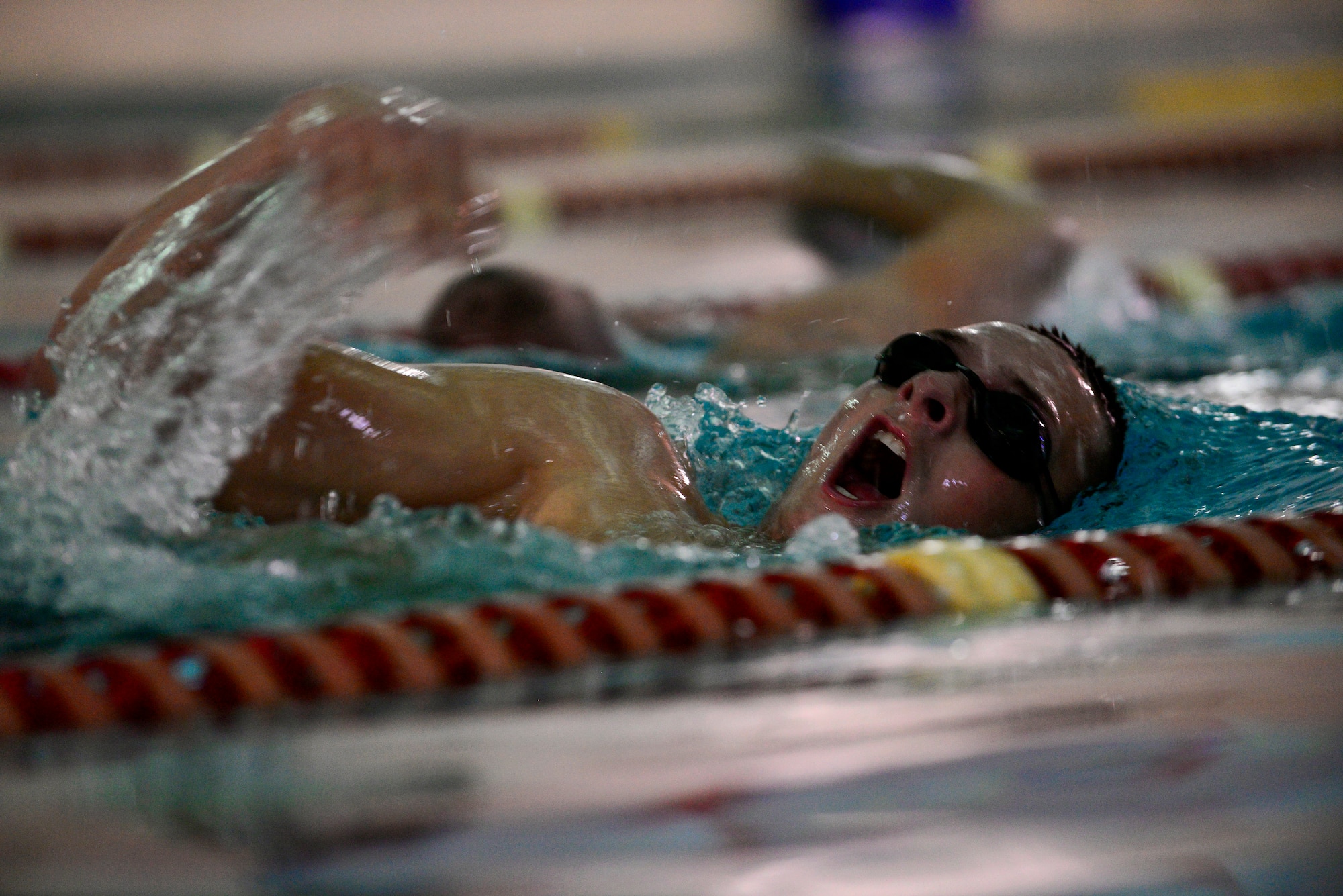 A U.S. Air Force Airman participates in the swimming portion of the physical ability and stamina test at the Young Men’s Christian Association in Sumter, S.C., Dec. 10, 2014. For the PAST, aspiring pararescue, combat control, and special operations weather Airmen are required to perform three timed swims including two 25-meter underwater swims and one 500-meter surface swim. (U.S. Air Force photo by Airman 1st Class Diana M. Cossaboom/Released)