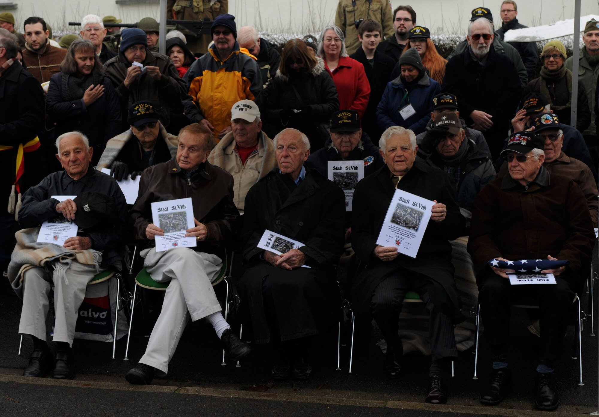 U.S. Army veterans sit together during a Battle of the Bulge memorial ceremony at St. Vith, Belgium, Dec. 14, 2014. More than a dozen veterans attended the ceremony marking the 70th anniversary of the battle. (U.S. Air Force photo by Airman 1st Class Luke Kitterman/Released) 