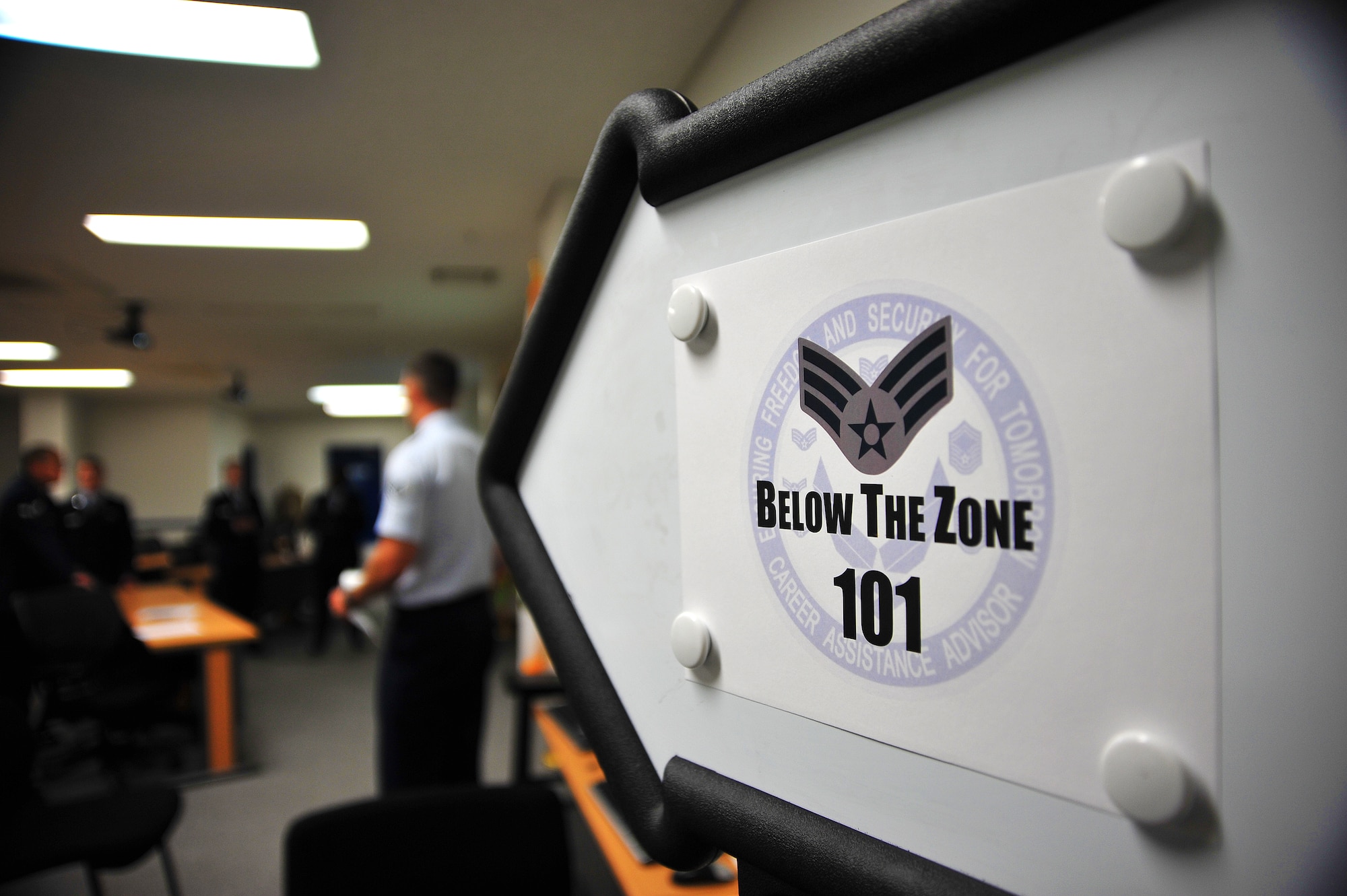 A group of U.S. Air Force Airmen wait to take part in a mock senior airman below-the-zone promotion board during a BTZ 101 class at Misawa Air Base, Japan, Dec. 15, 2014. The mock board was the secondary portion of the day-long class designed to teach Airmen how to prepare for BTZ promotion to the rank of senior airman. (U.S. Air Force photo by Senior Airman Jose L. Hernandez-Domitilo)