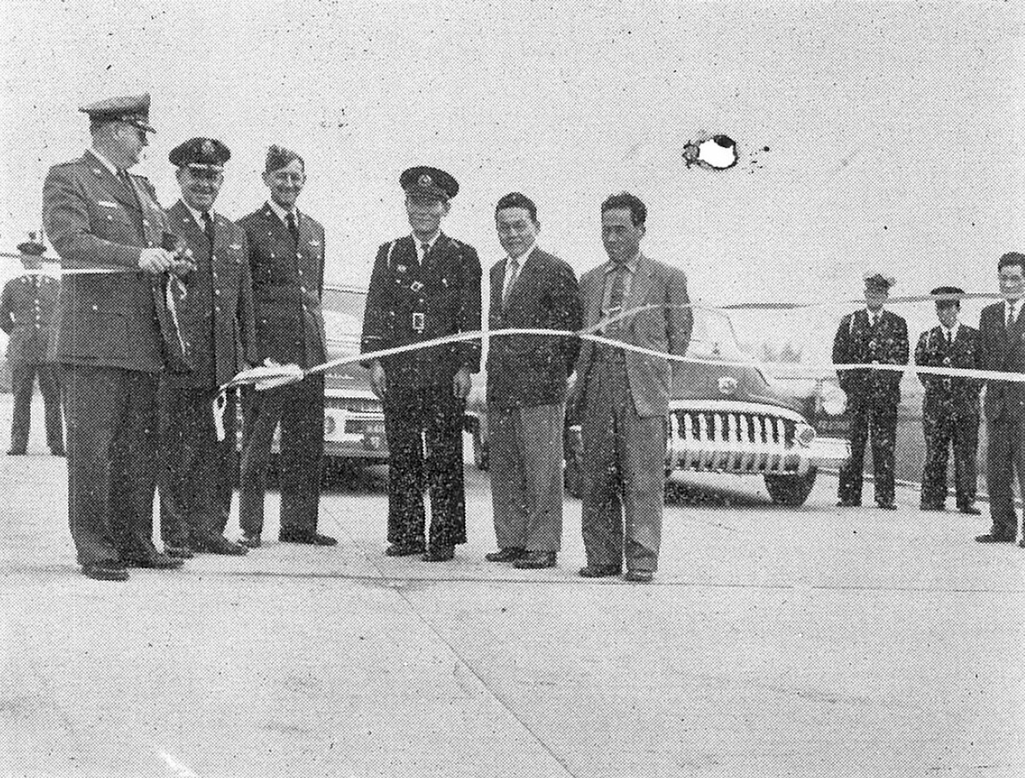 April 1958 ribbon cutting ceremony for the reopening Route 16 -- then
known as the Old Nikko Highway -- following the northern extension of
Yokota's runway. (U.S. Air Force photo courtesy of the 374th Airlift Wing History Office)