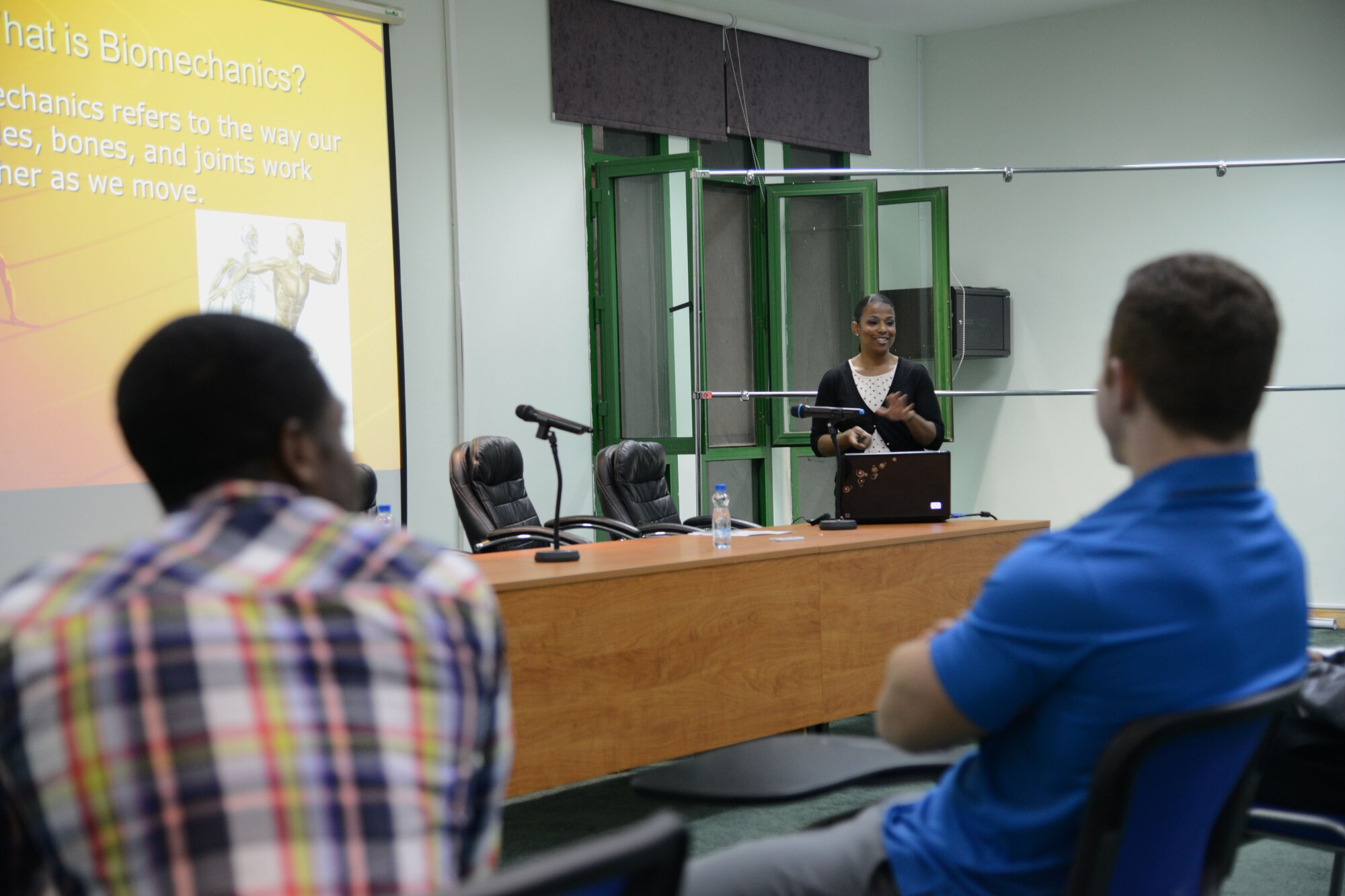 SOUTHWEST ASIA – Capt. Latasha Westfall, 386th Expeditionary Medical Group registered nurse, lectures on running biomechanics during a seminar hosted by the Public Authority for Youth Sports here Dec. 16, 2014. This is the second seminar held by PAYS and the 386th EMDG.