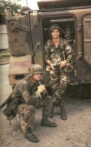 Maj. Dave King, director of the State Partnership Program with South Carolina Army National Guard, stands in front of his M113 armored personnel carrier as a 1st lieutenant from combat operations from Operation Just Cause in Panama in 1989.  King was a member of the 4-6th Infantry Battalion, 5th Infantry Division (Mechanized) and was part of the ground invasion which commenced Dec. 20, 1989. This year 2014 marks the 25th anniversary of Operation Just Cause.