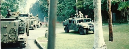 U.S. Army M113 armored personnel carriers travel on a road in Panama during Operation Just Cause in December 1989. The invasion of Panama began Dec. 20, 1989, when U.S. military forces were called to remove the regime of Manuel Noriega in Panama. 