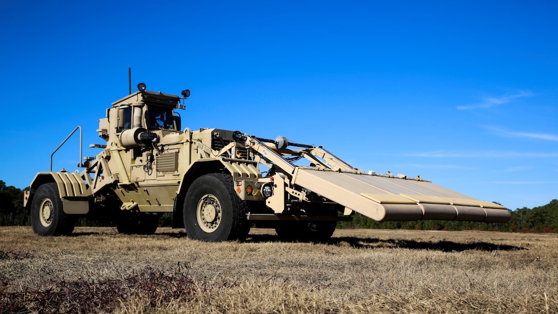 A Husky tactical support vehicle prepares to find simulated improvised explosive devices using ground penetrating radar during a field training exercise Dec. 13, 2014, at training site GE on Camp Lejeune, N.C. Marines with 2nd Combat Engineer Battalion and Explosive Ordnance Disposal Company, 8th Engineer Support Battalion, performed a route clearance exercise, ridding a roadway of simulated IED’s so that other vehicles could safely travel the route.