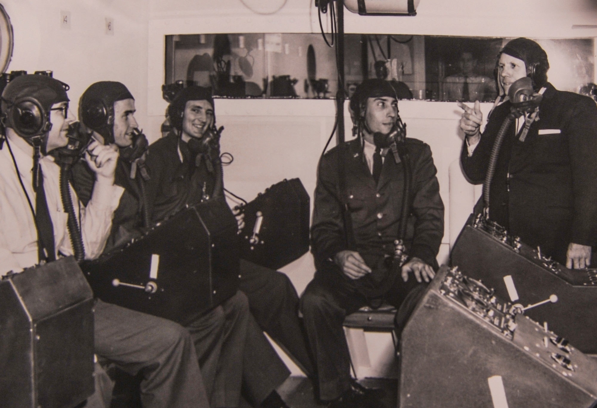 A group of Airmen tour the hypobaric chamber after it was opened in the early 1960s, at Little Rock Air Force Base, Ark. For more than 50 years, the chamber has allowed troops to experience the effects high altitude has on the body. (Courtesy photo)