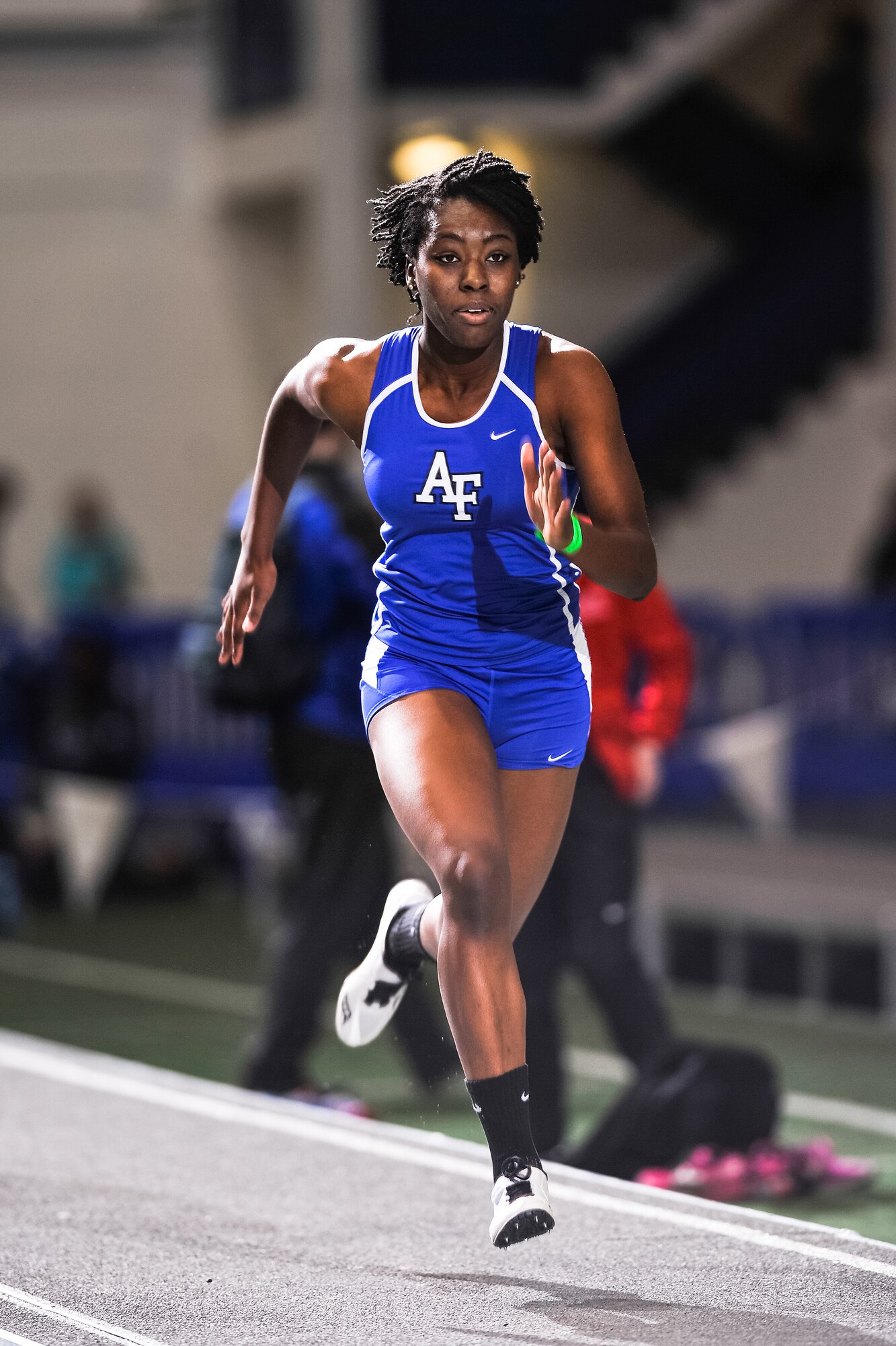 Funmi Akinlosotu gathers speed during the long jump event at the Air Force Track and Field Holiday Open at the Academy’s Cadet Field House’s indoor track Dec. 12, 2014. Akinlosotu, a freshman at the Academy, finished third at 35'5". (U.S. Air Force photo/Liz Copan)