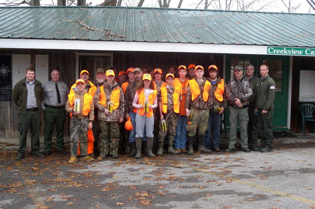 Youth hunters, mentors and sponsors pose together Dec. 7, 2014 following the two-day 2014 Defeated Creek Youth Deer Management Hunt held at Defeated Creek Recreation Area in Carthage, Tenn.