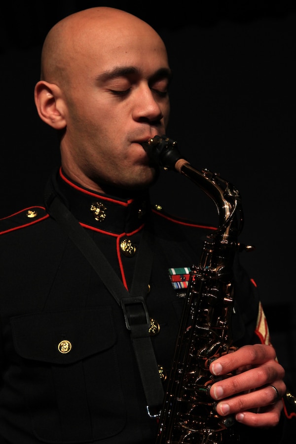 Staff Sgt. Eric Kyne practices in William H. Hall High School’s auditorium while waiting to talk to music students Dec. 18. Kyne was a student at the high school and part of its prestigious Jazz Program. Kyne played in the auditorium throughout his years at the school. Kyne is a Marine musician and recruiter with Marine Recruiting Substation Hartford. (Official Marine Corps Photo by Sgt. Richard Blumenstein)