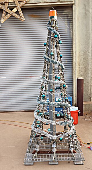 The 446th Airlift Wing's Citizen Airmen from the 36th and 86th Aerial Port Squadrons, along with Airmen from the active-duty’s 62nd Aerial Port Squadron from Joint Base Lewis-McChord, Washington, get creative with their holiday decorating while deployed in support of Air Force operations in Senegal are part of Operation United Assistance.  (Courtesy photo)