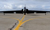 A U-2 Dragon Lady carrying Santa Claus arrives during the Children's Holiday Party at Beale Air Force Base, Calif., Dec. 13, 2014. Toys for the Troops donated thousands of wrapped presents to Team Beale.  (U.S. Air Force photo by Staff Sgt. Robert M. Trujillo/Released)