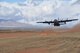A C-130 from the 94th Airlift Wing, Dobbins Air Reserve Base, takes off from a dirt runway in Arizona on Dec. 17, 2014. The plane had just landed, and took turns landing with another C-130 during training. (U.S Air Force Photo by Senior Airman Miles Wilson)