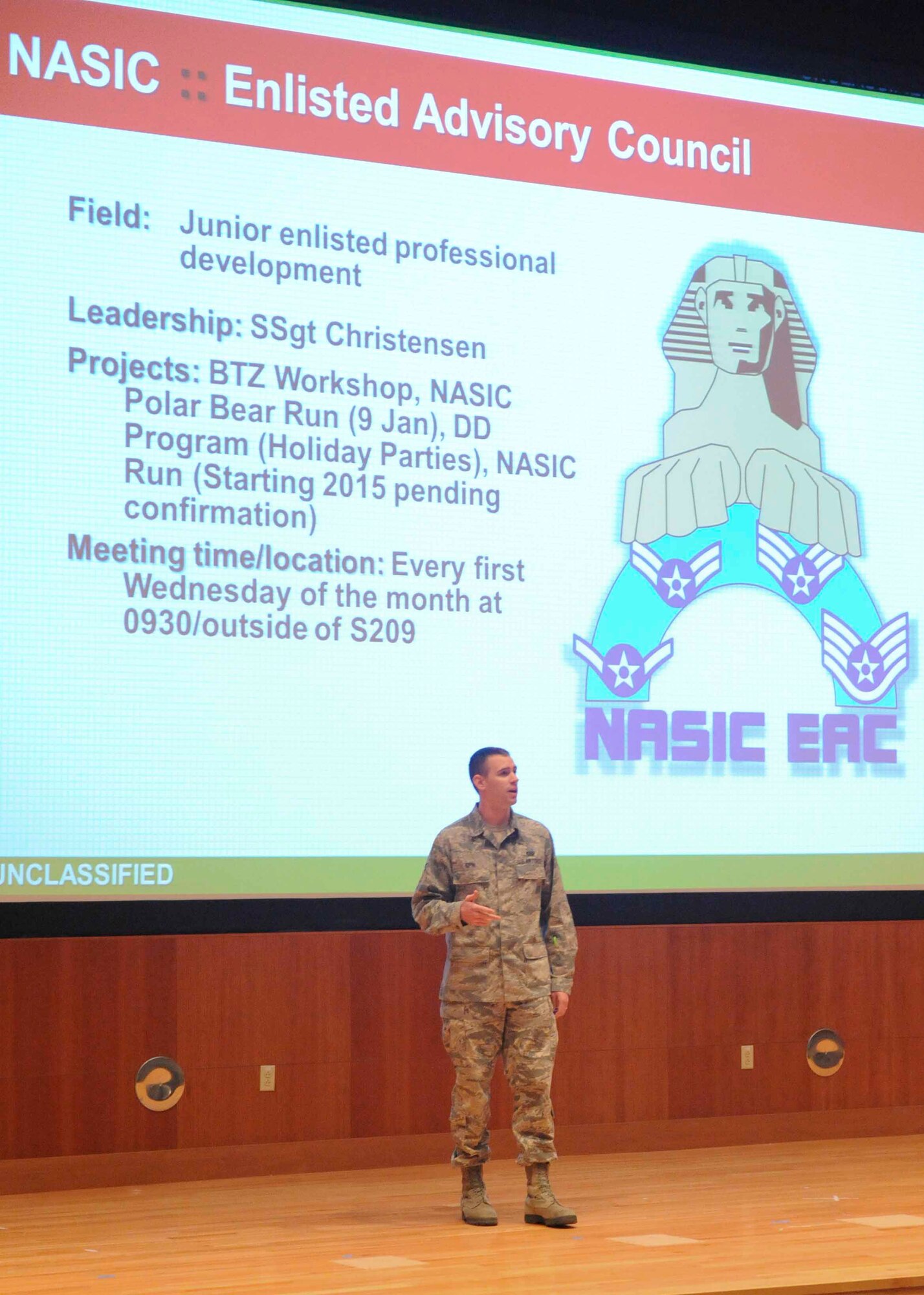 WRIGHT-PATTERSON AIR FORCE BASE, Ohio -- Senior Airman Randy Sipin, National Air and Space Intelligence Center, gives a brief  presentation on the individual clubs offered to the Airmen during NASIC's Professional Club Recruitment Day here, Dec. 17. During the event representatives were able to speak with Airmen about their respective organizations, and, if interested, Airmen were given membership opportunities. The recruitment day was held to show how important these organizations are to the professional development of Airmen. (U.S. Air Force photo by Airmen 1st Class Samuel Earick)