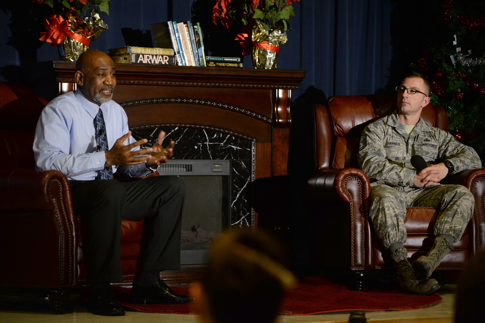 ALTUS AIR FORCE BASE, Okla. – Osborn Richardson, 97th Logistics Readiness Squadron chief of deployment and distribution flight, shares a story during a Storytellers event at the Freedom Community Center, Dec. 17, 2014. Richardson spoke about growing up on a farm in Mississippi, playing football at Mississippi State University and joining the U.S. Air Force. Storytellers allowed Airmen to share personal life experiences with other members of Altus AFB. (U.S. Air Force photo by Senior Airman Franklin R. Ramos/Released)