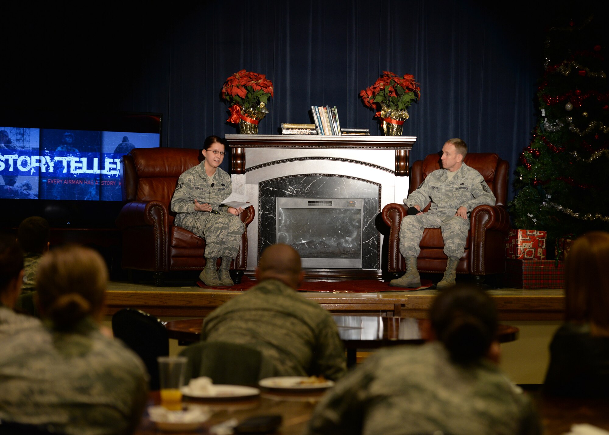 ALTUS AIR FORCE BASE, Okla. – U.S. Air Force Staff Sgt. Emma Border, 97th Security Forces Squadron NCO in charge of installation access, speaks of situations that occurred in her life during a Storytellers event at the Freedom Community Center, Dec. 17, 2014. Border spoke of the challenges and sacrifices that come with losing loved ones to cancer. The purpose of Storytellers is to allow Airmen to share their stories, which can make a difference and change lives. (U.S. Air Force photo by Senior Airman Franklin R. Ramos/Released)