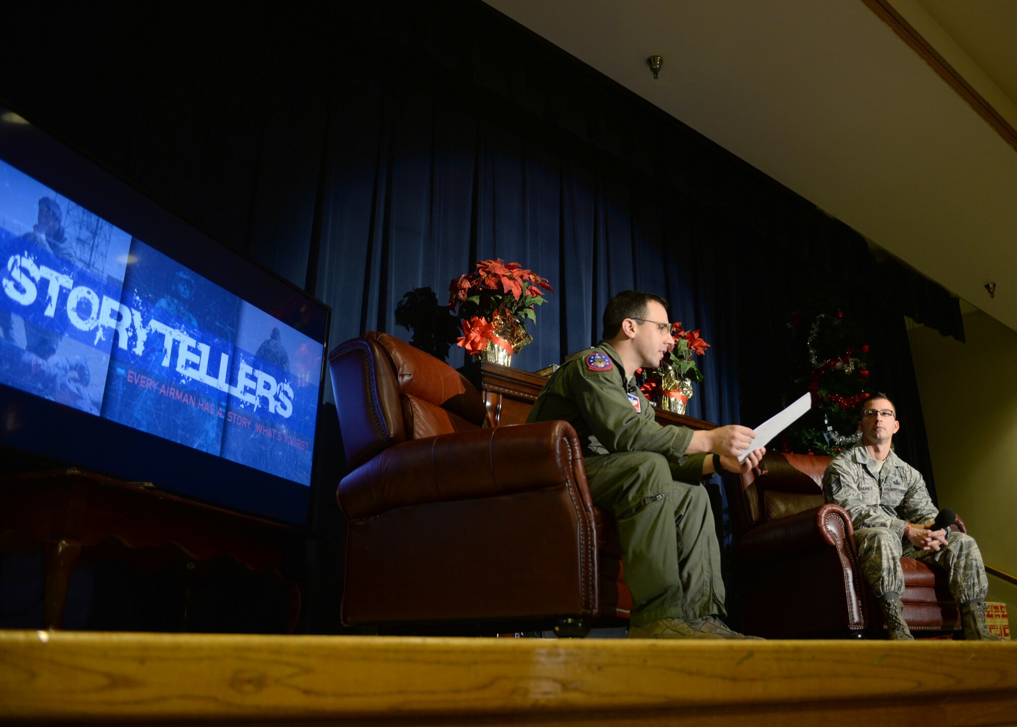 ALTUS AIR FORCE BASE, Okla. – U.S. Air Force Capt. Sean McConville, 58th Airlift Squadron C-17 Globemaster III weapons officer, tells a story during a Storytellers event at the Freedom Community Center, Dec. 17, 2014. McConville spoke of a childhood mentor who believed in him through a tough time in his life. The purpose of Storytellers is to allow Airmen to share their stories, which could help motivate other Airmen. (U.S. Air Force photo by Senior Airman Franklin R. Ramos/Released)