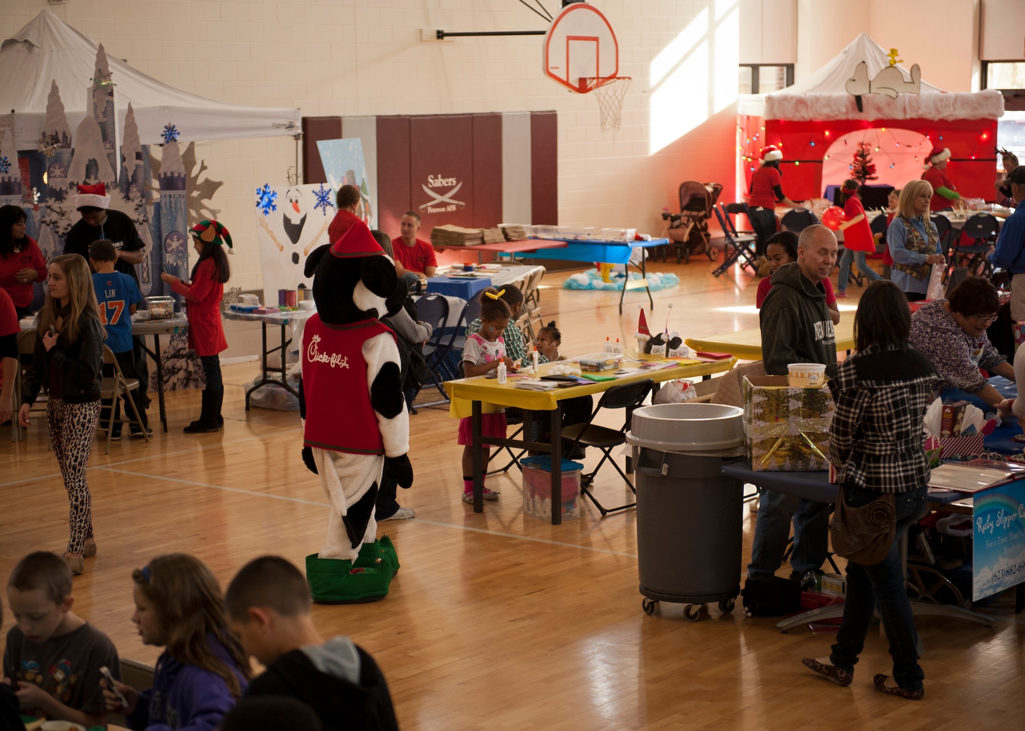 PETERSON AIR FORCE BASE, Colo. – Many children enjoyed each station at the Winter Wonderland event at the R. P. Lee Youth Center, Dec. 13, 2014. The second annual Winter Wonderland was held to celebrate the beginning of the winter season and the holidays with crafts, face painting, snacks, Santa and much more. Admission was $5 plus a non-perishable food item or something for a pet, which the Boys and Girls Club Keystone Club will be donating to local needy families. (U.S. Air Force photo by Airman 1st Class Rose Gudex)