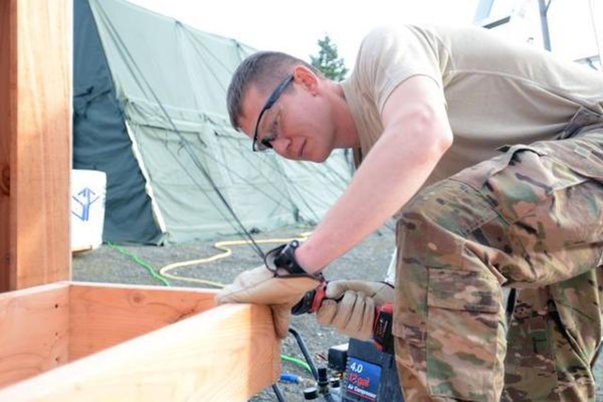 Capt. John Richwine passes his time in controlled monitoring by building gazebos at the World War II barracks on Lewis North. (Norhtwest Guardian/courtesy photo)