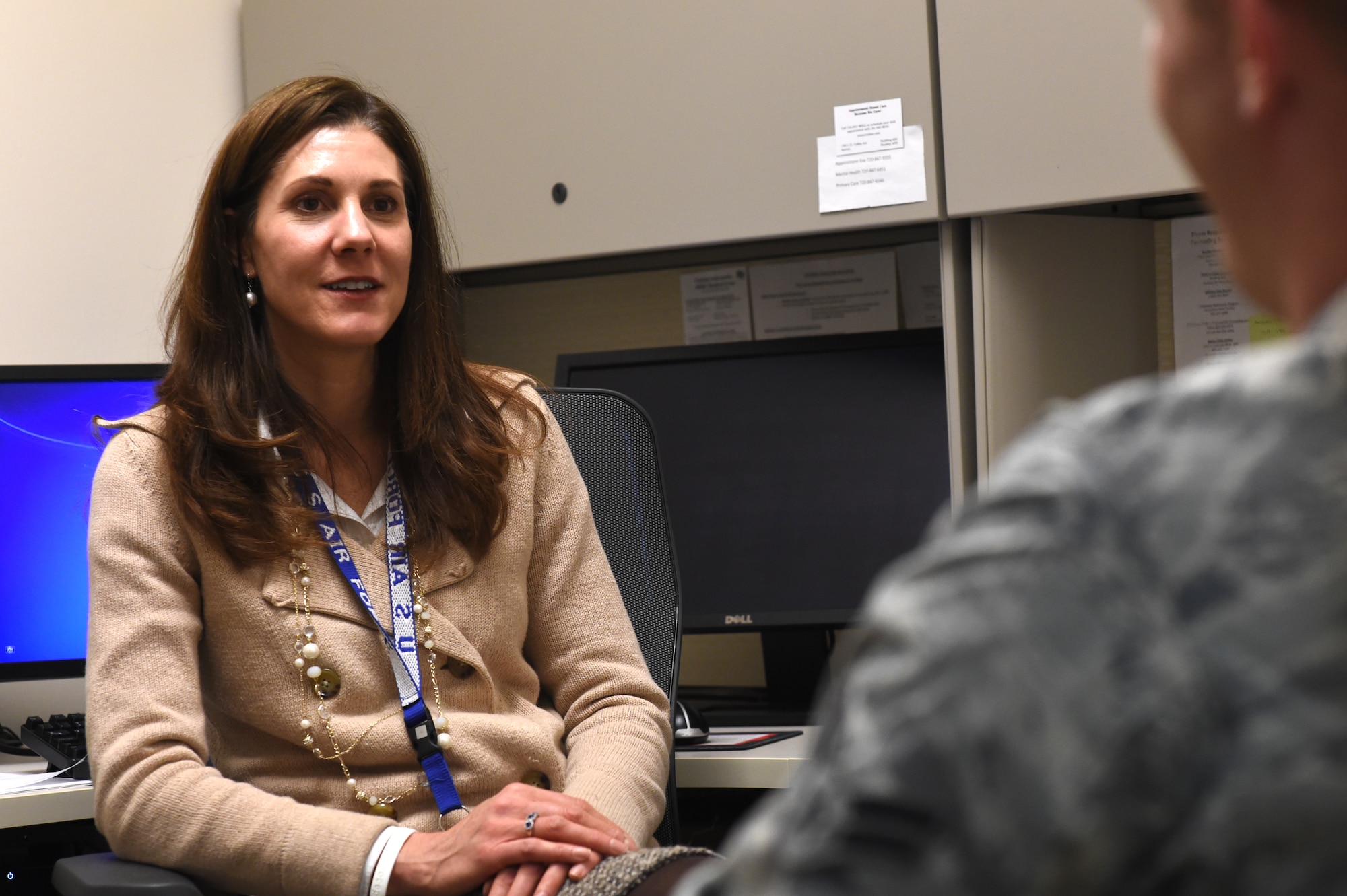 Dr. Shannon O’Connor, Buckley Behavioral Health Optimization Program professional, speaks with a patient Dec. 18, 2014, at the VA Joint Venture Buckley Clinic in Aurora, Colo. BHOP is way for service members and their families to speak with a licensed therapist about any issues they may be experiencing. (U.S. Air Force photo by Airman 1st Class Samantha Saulsbury/Released)
